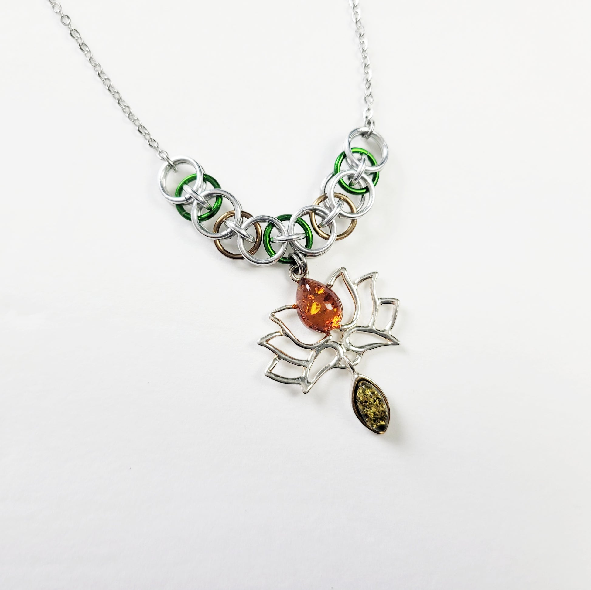 Lotus amber necklace with green and orange Baltic amber