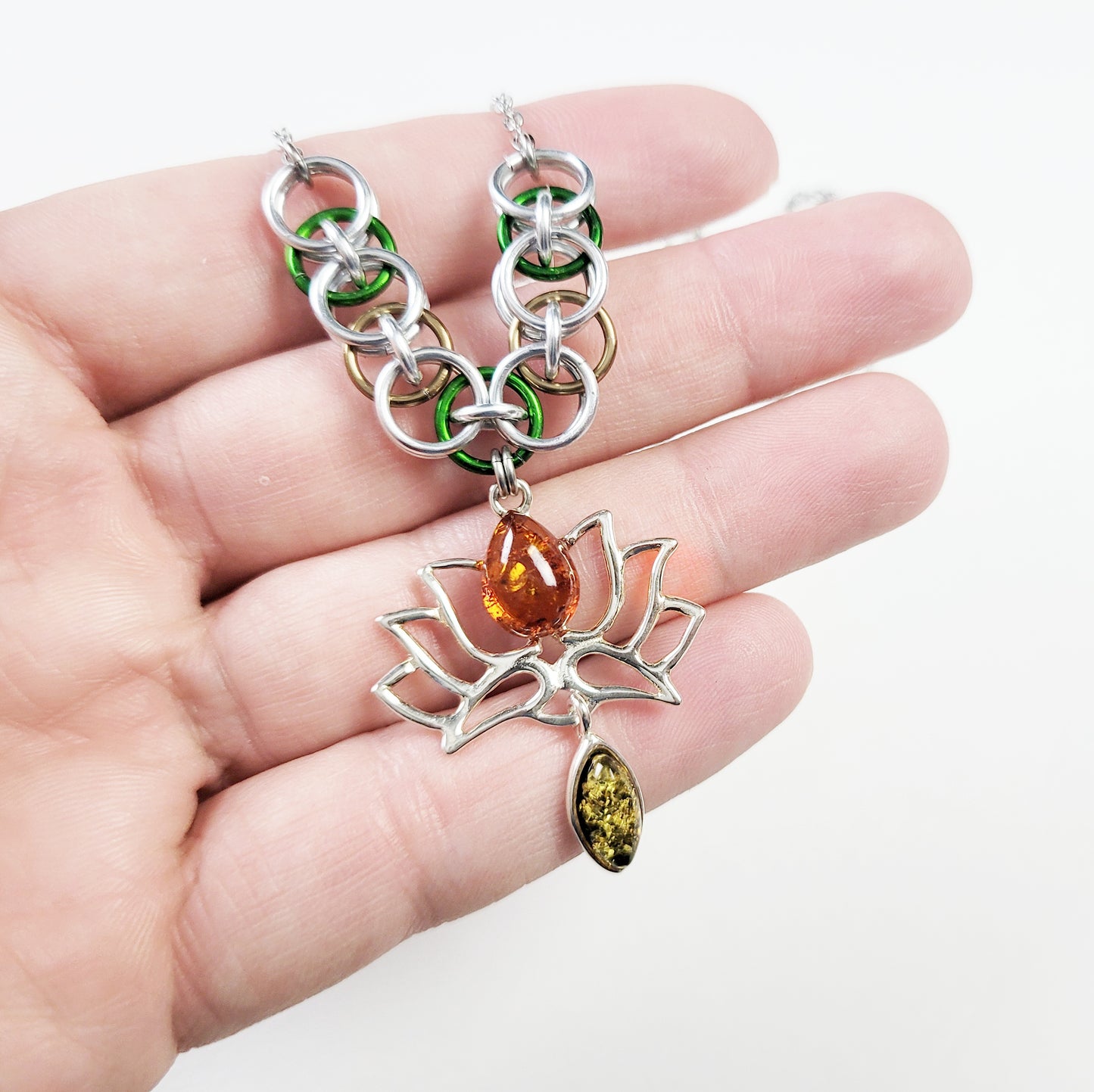 Handwoven chainmail necklace with lotus pendant