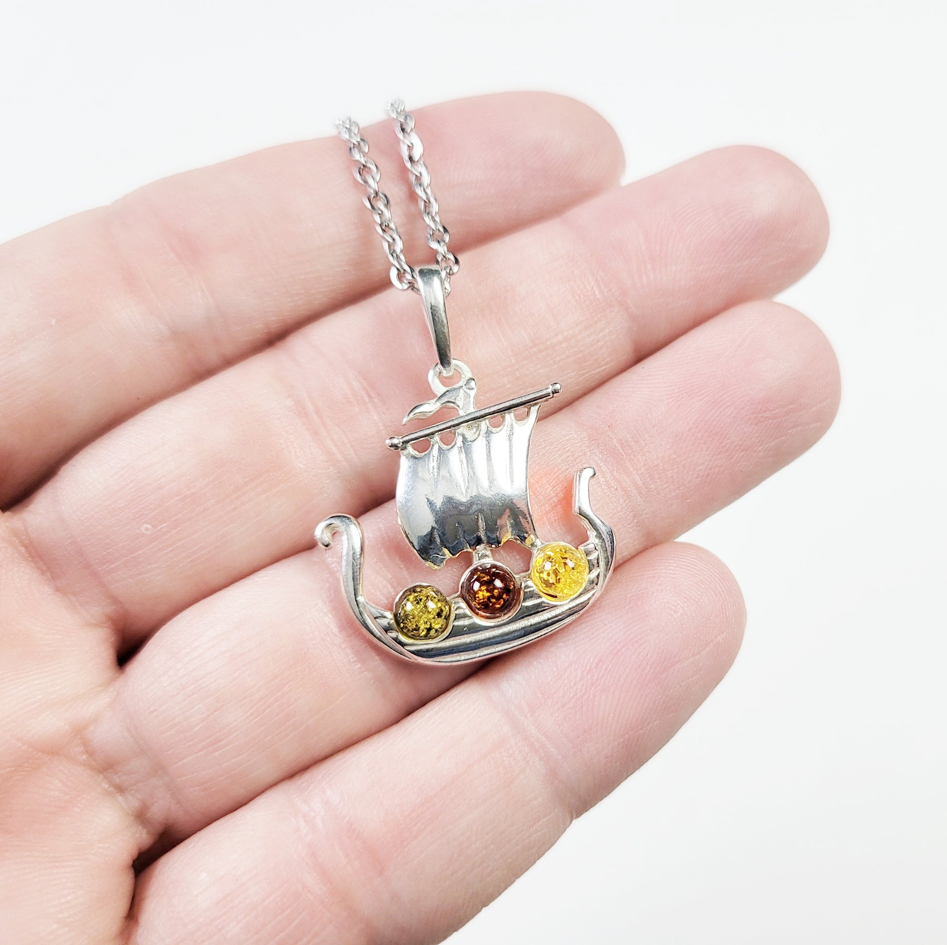 Symbolic Norse-inspired amber necklace for warrior women