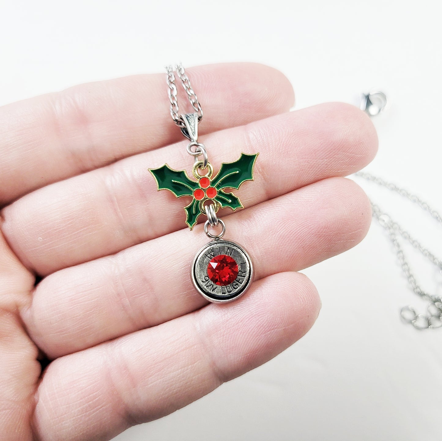 Redneck Christmas jewelry – bullet necklace with red or green crystal